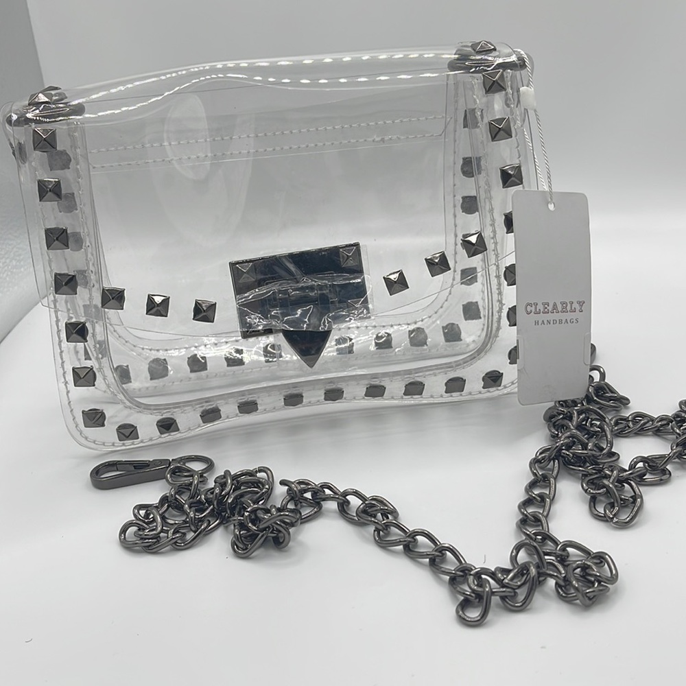 Clearly handbag with gunmetal studs, chain and closure